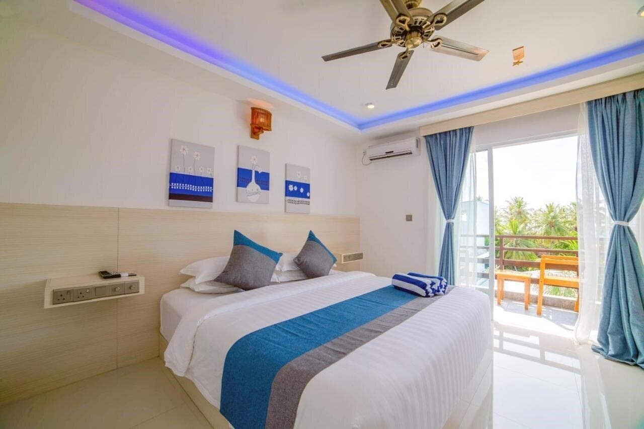 Апартаменти Grand Beach Dhigurah Guest House гостиный двор